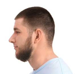 Young man with hearing problem on white background