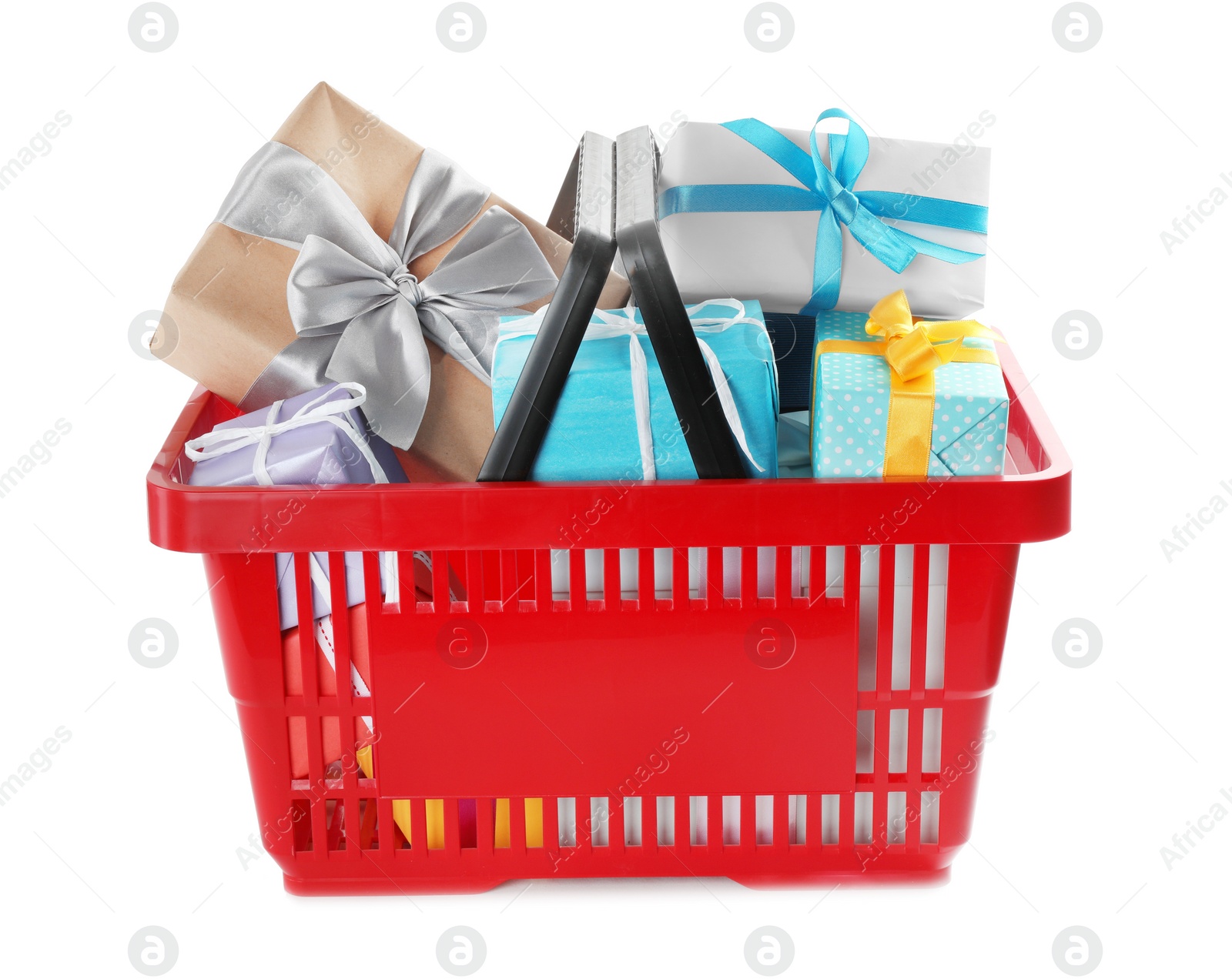 Photo of Red shopping basket with different gifts on white background