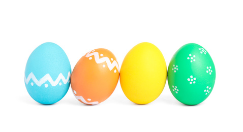 Photo of Colorful Easter eggs with different patterns isolated on white