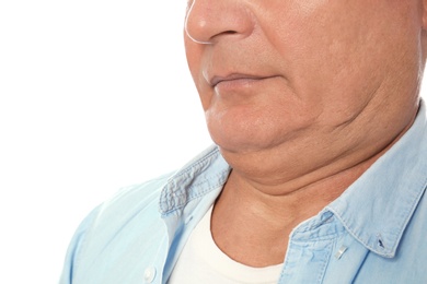 Photo of Mature man with double chin on white background, closeup