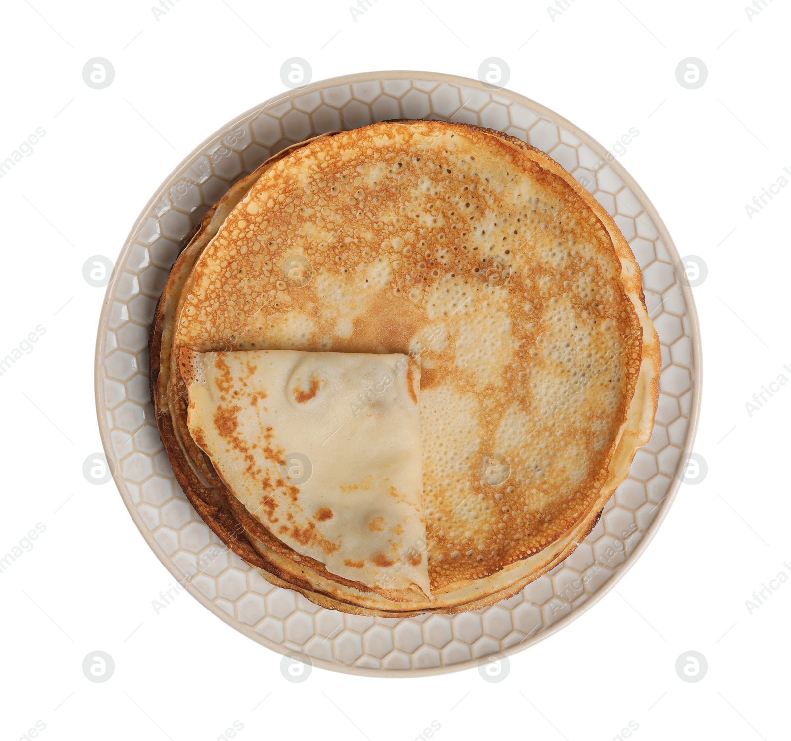 Photo of Stack of delicious crepes on plate against white background, top view