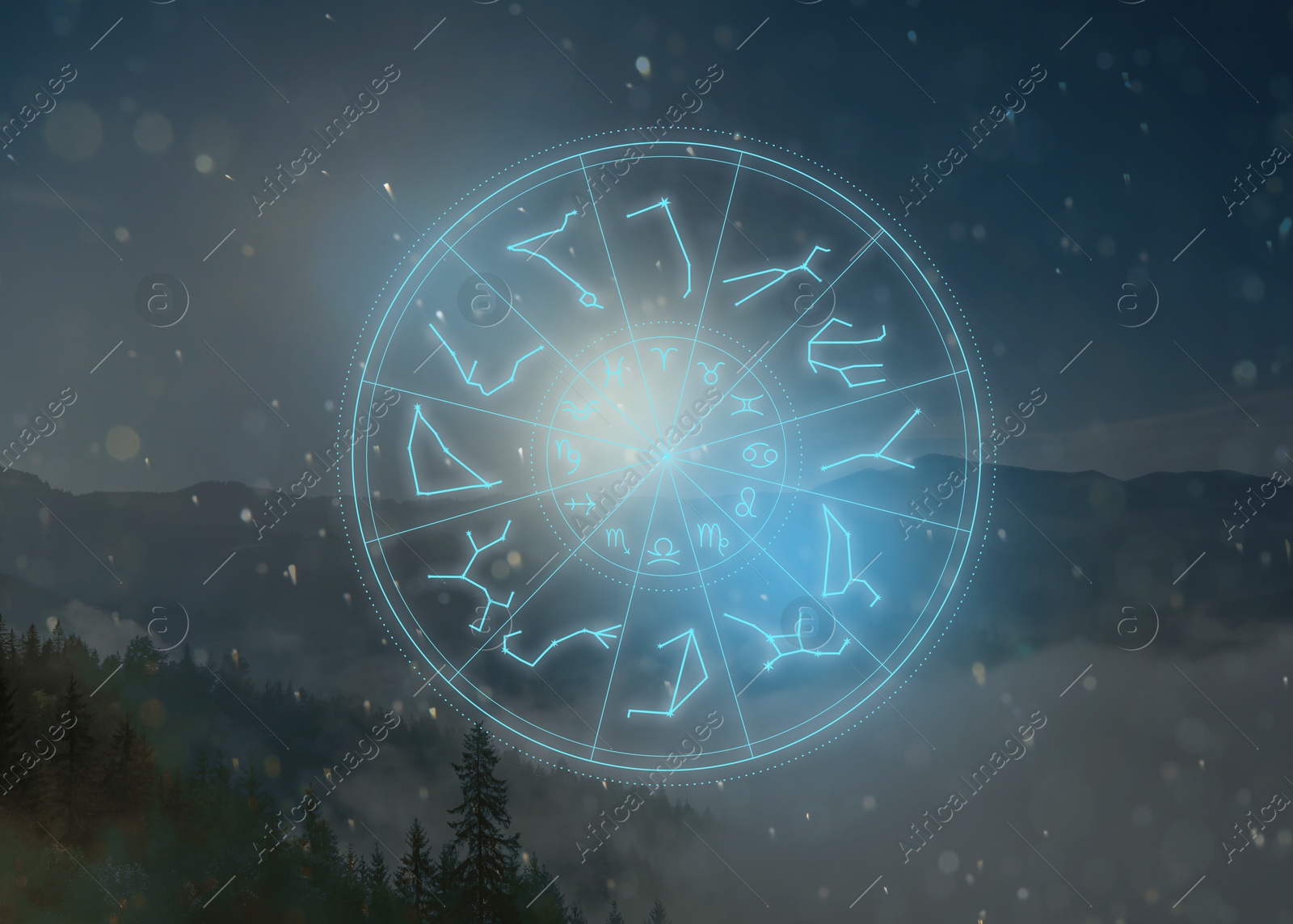 Image of Zodiac wheel with 12 astrological signs and star constellations and mountain landscape on background