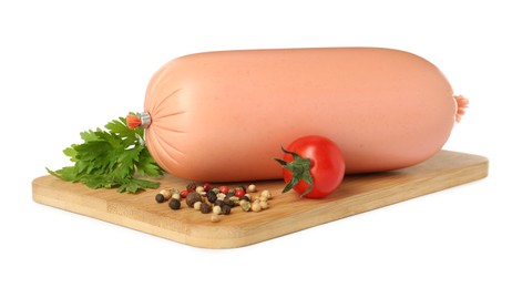 Photo of Wooden board with delicious boiled sausage, tomato, parsley and peppercorns isolated on white