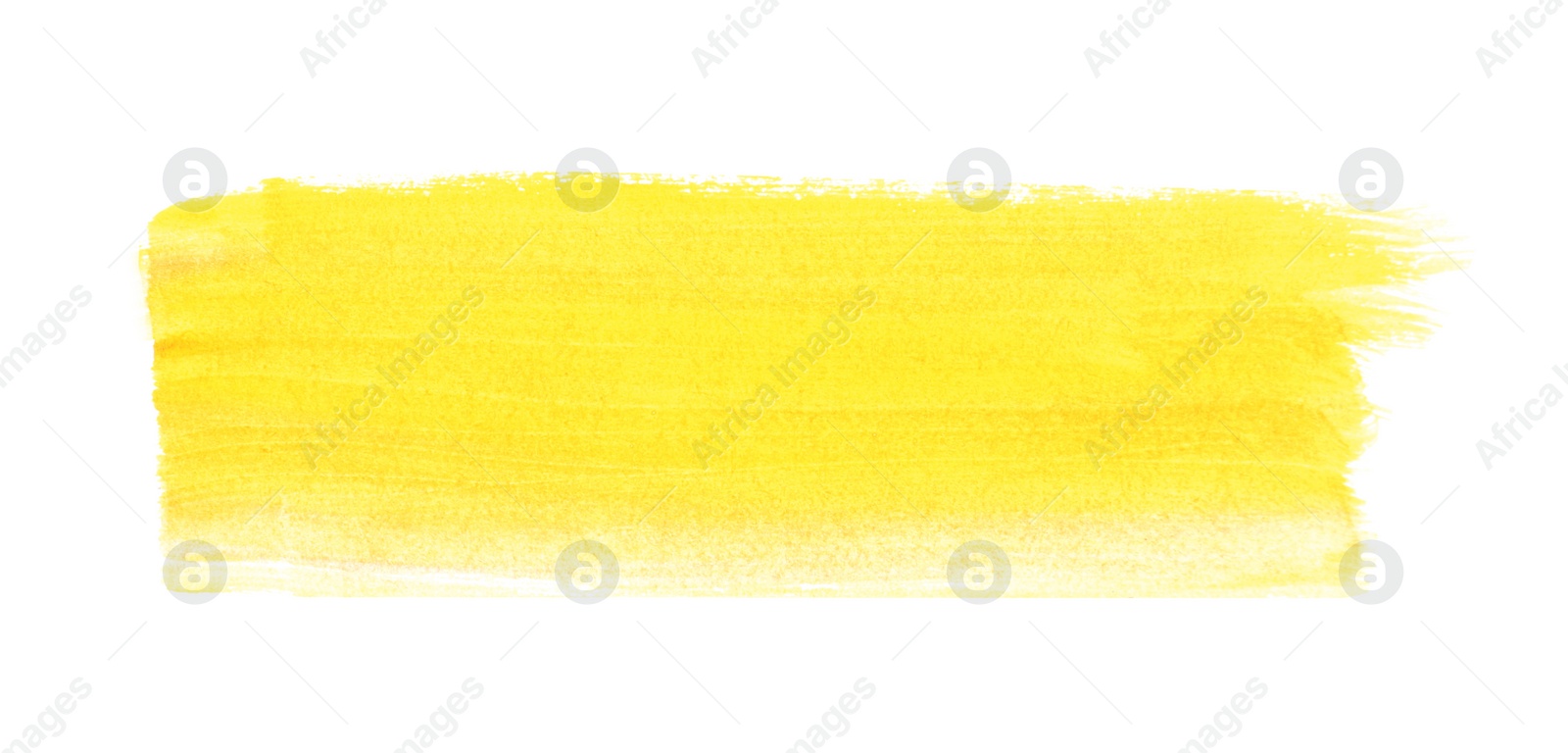 Photo of Yellow paint stroke drawn with brush on white background, top view