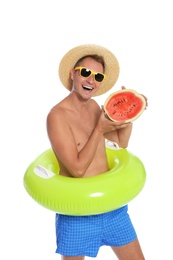 Photo of Shirtless man with inflatable ring and watermelon on white background