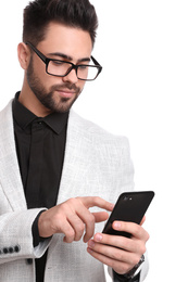 Photo of Young businessman with smartphone on white background