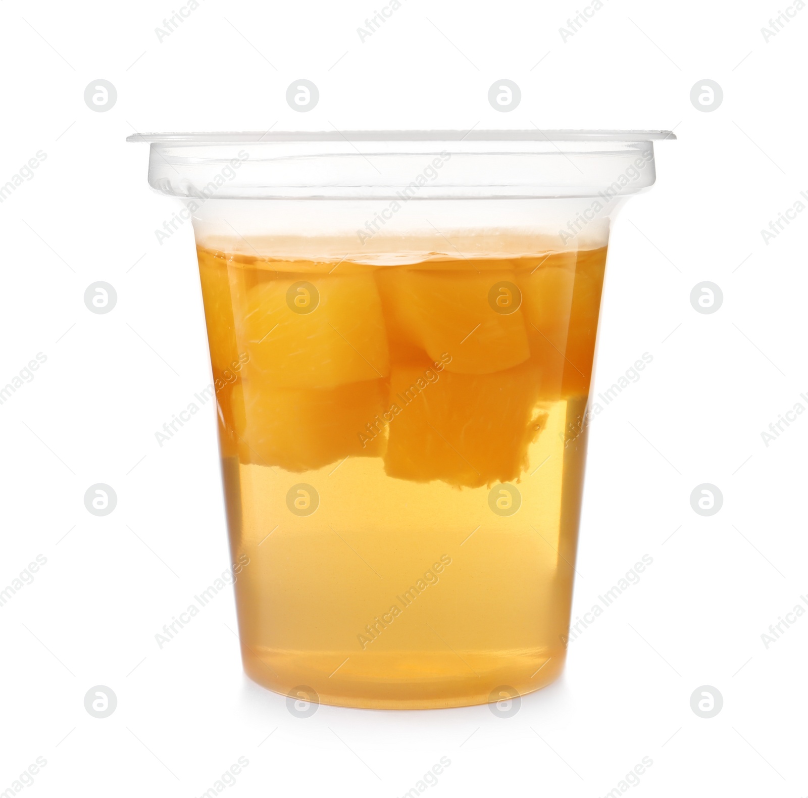 Photo of Tasty jelly dessert with slices of fruit in plastic cup on white background