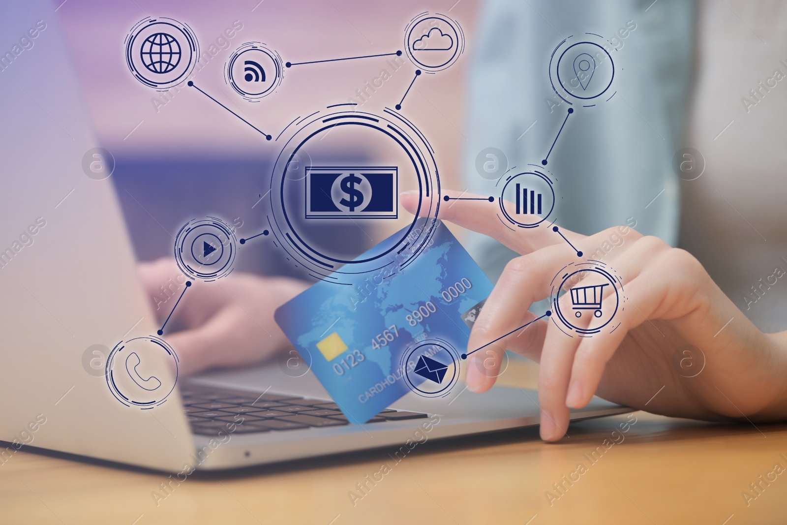 Image of Woman with credit card using laptop for online payment at wooden table, closeup