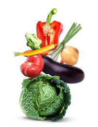 Image of Stack of different fresh vegetables isolated on white