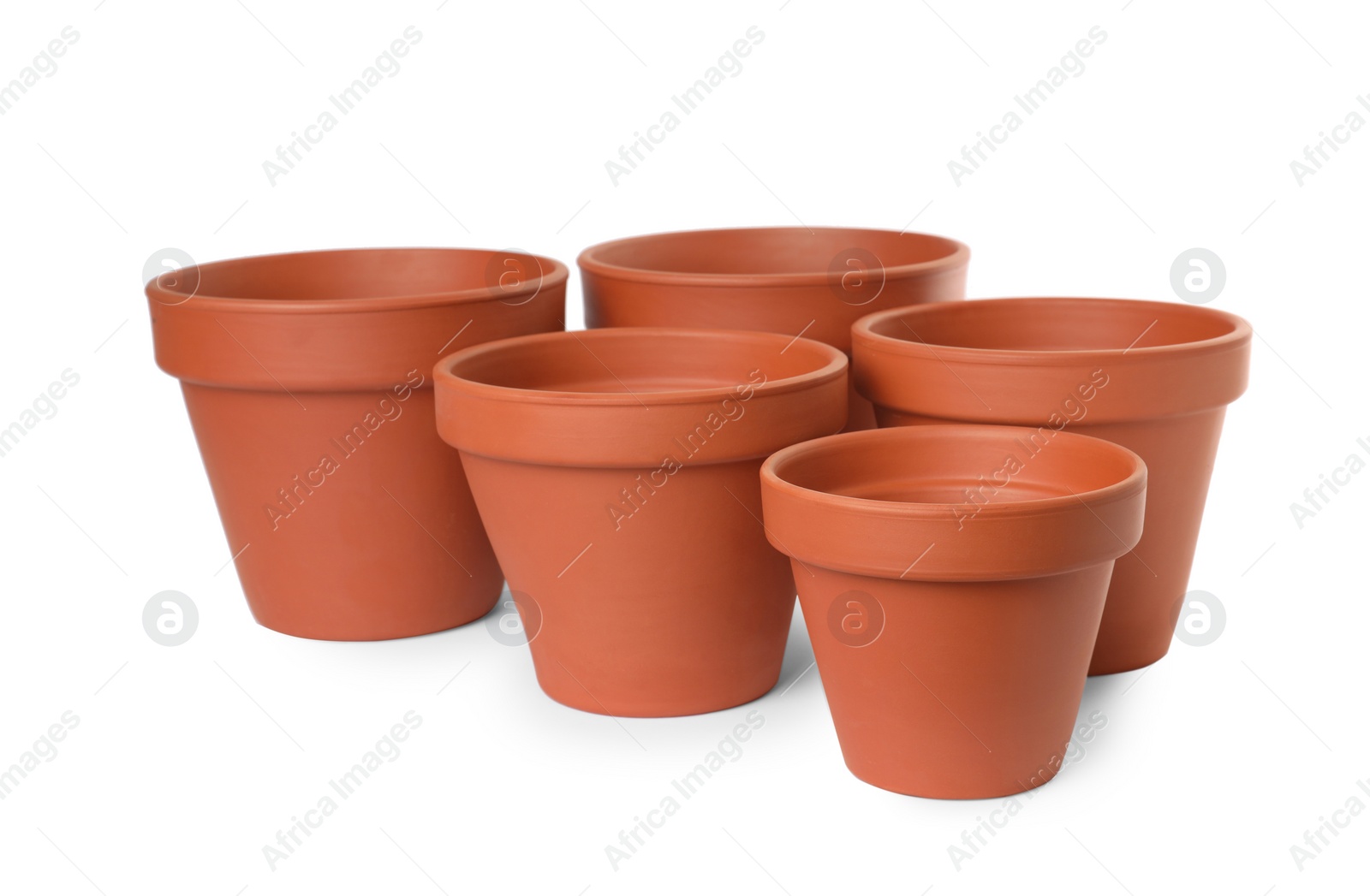 Photo of Empty clay flower pots isolated on white