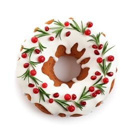 Photo of Traditional Christmas cake decorated with glaze, pomegranate seeds, cranberries and rosemary isolated on white, top view
