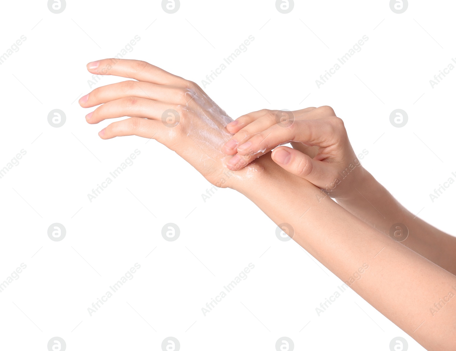 Photo of Young woman applying hand cream on white background