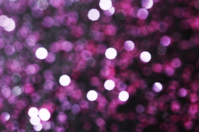 Magic pink bokeh effect on dark background