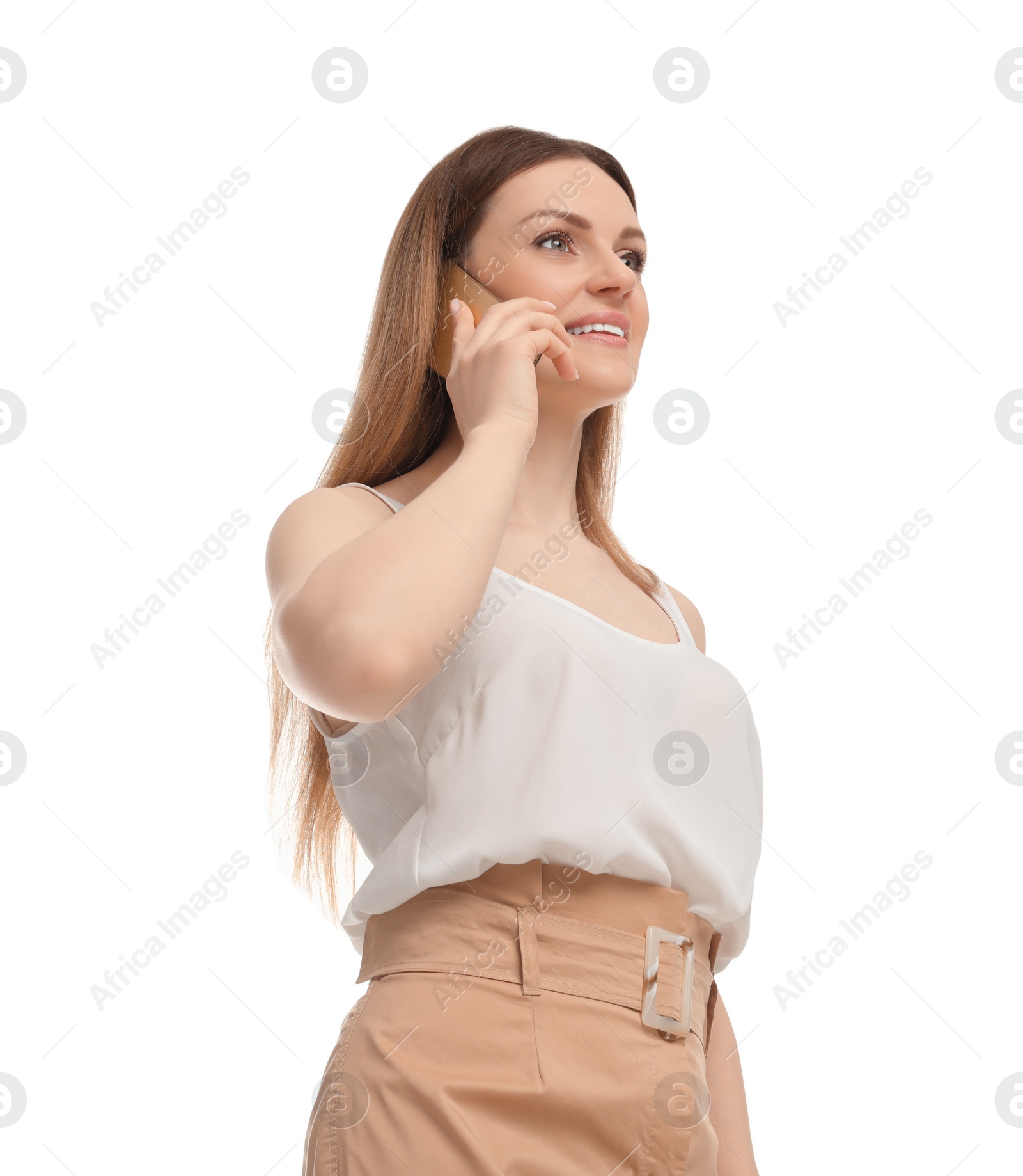 Photo of Beautiful businesswoman talking on smartphone against white background, low angle view