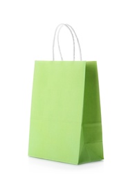 Photo of Mockup of paper shopping bag on white background