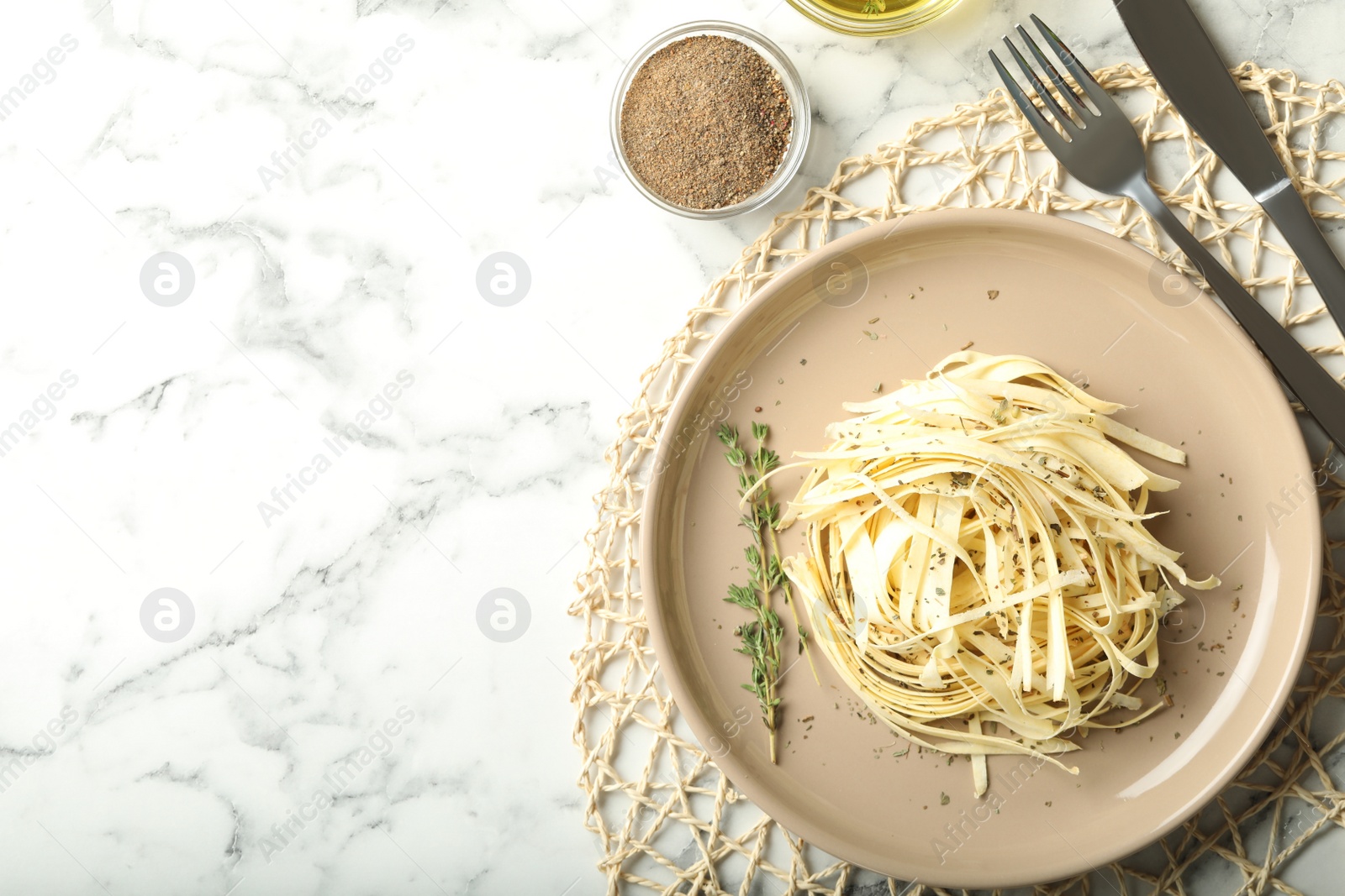 Photo of Fresh white carrot salad served on marble table, flat lay. Space for text