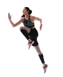 Photo of Athletic young woman running on white background, side view