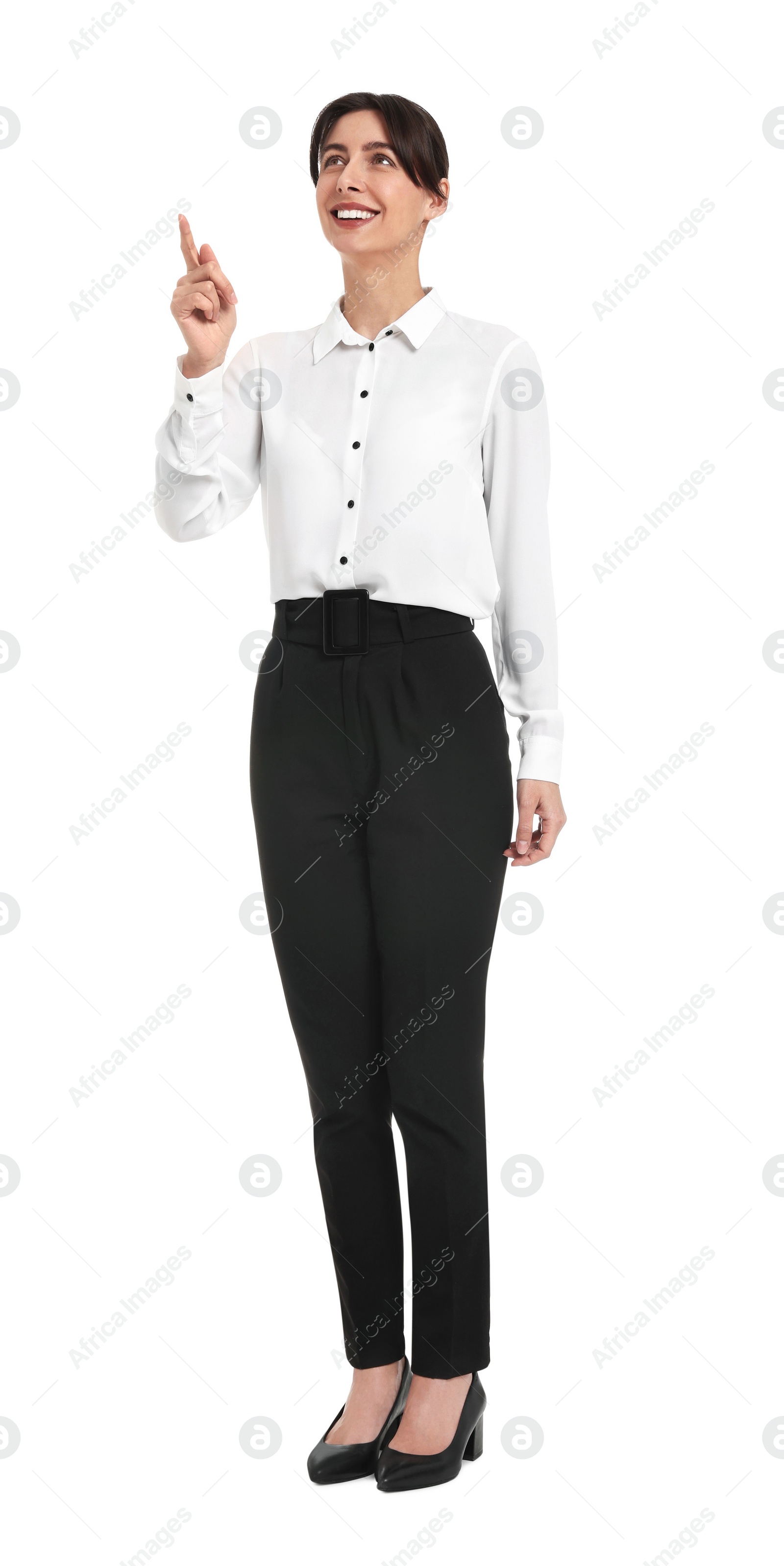 Photo of Happy businesswoman pointing at something on white background