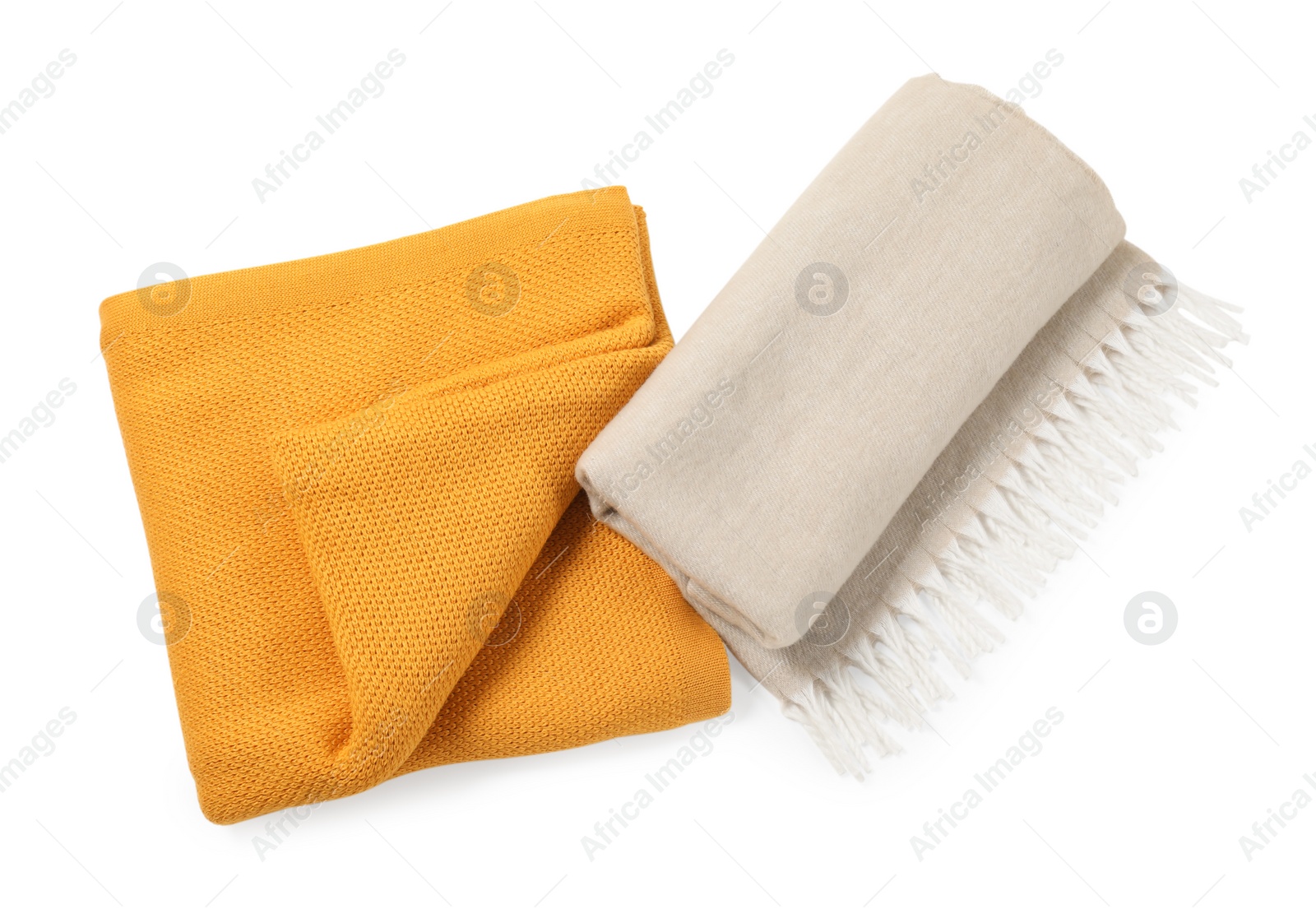 Photo of Two soft warm blankets isolated on white, top view