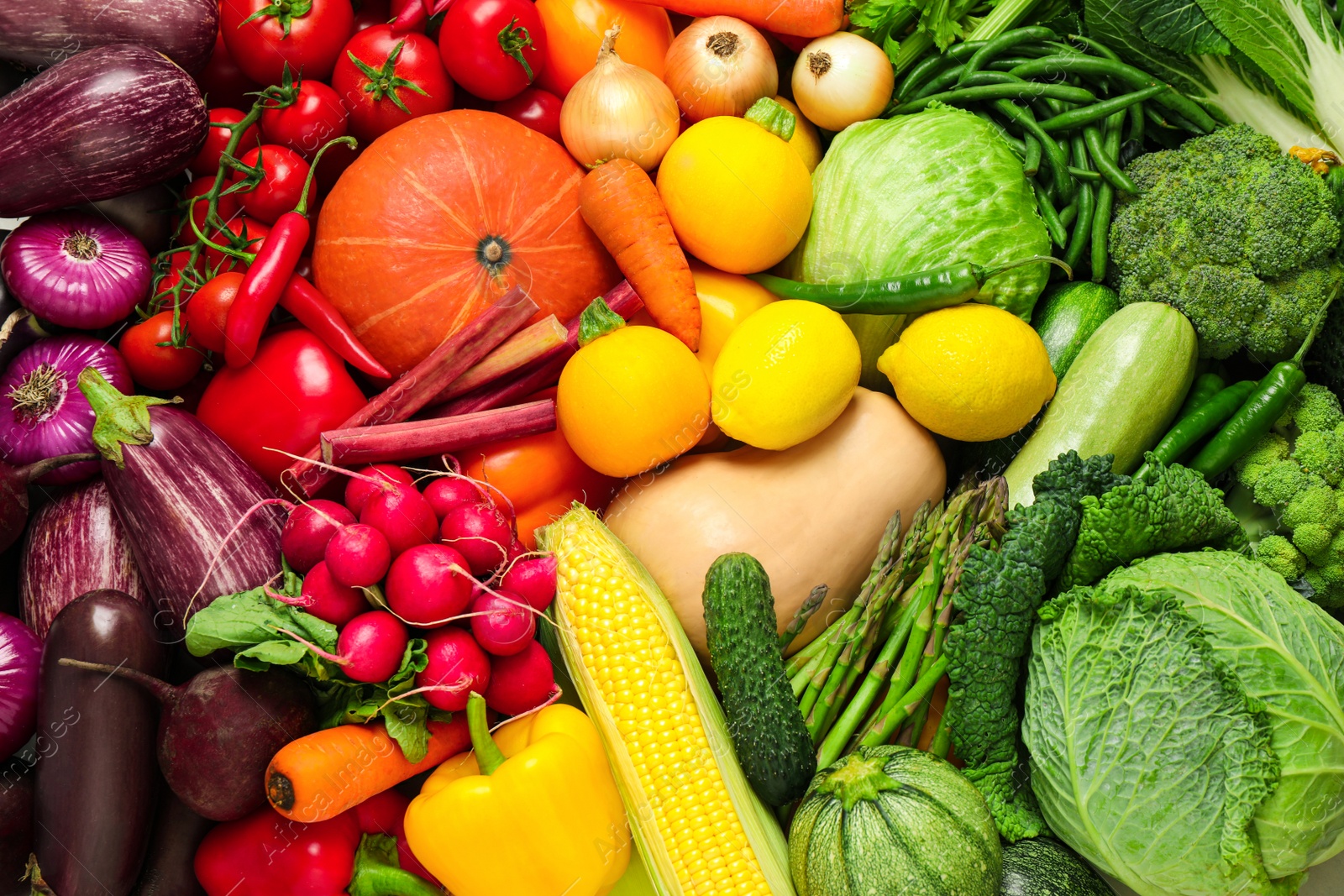 Photo of Many fresh vegetables as background, top view