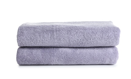 Fresh soft folded towels isolated on white