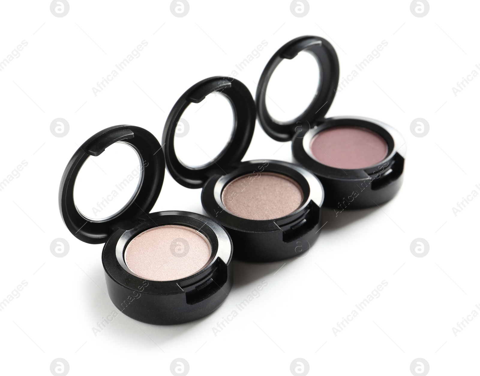 Photo of Different eye shadows on white background. Decorative cosmetics