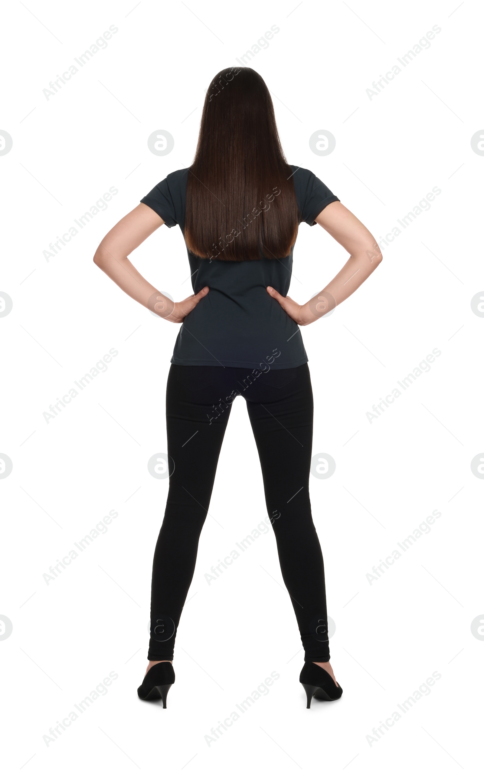 Photo of Woman wearing stylish black jeans on white background, back view