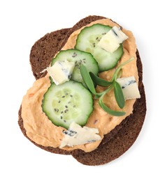 Delicious sandwich with hummus and ingredients on white background, top view