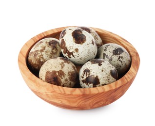 Photo of Wooden bowl with quail eggs isolated on white