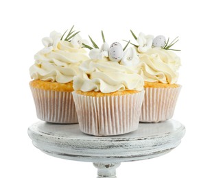 Photo of Tasty Easter cupcakes with vanilla cream isolated on white