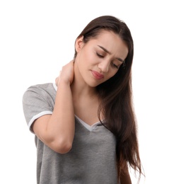 Photo of Young woman suffering from pain in neck on white background