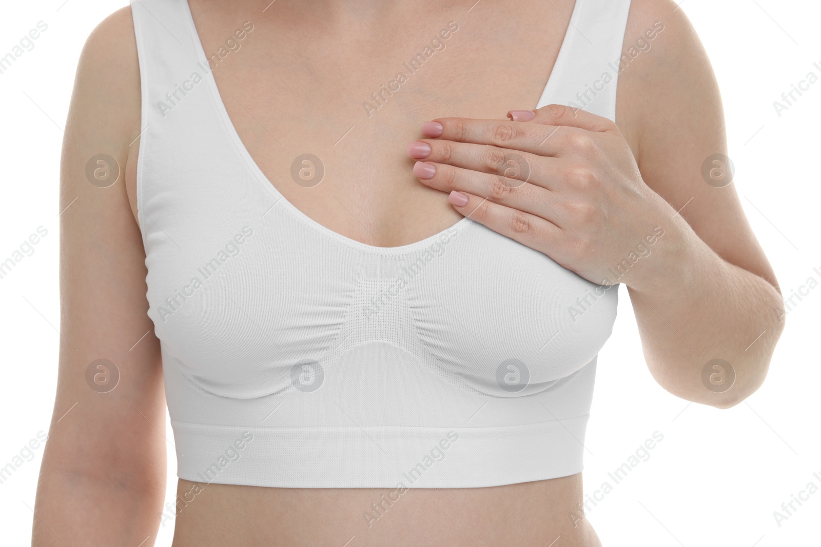 Photo of Mammology. Young woman doing breast self-examination on white background, closeup