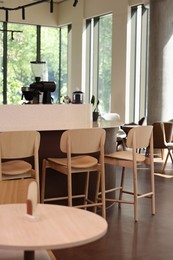 Photo of Modern cafe with stylish furniture. Interior design