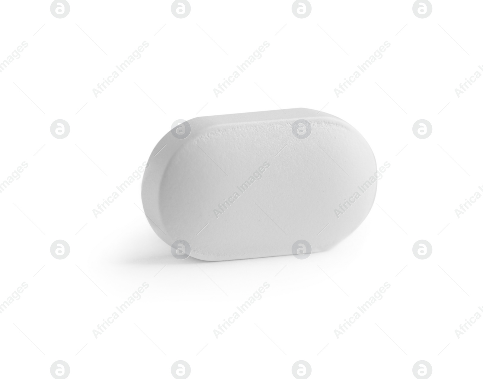 Photo of One pill on white background. Medicinal treatment