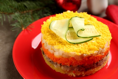 Traditional russian salad Mimosa on table, closeup