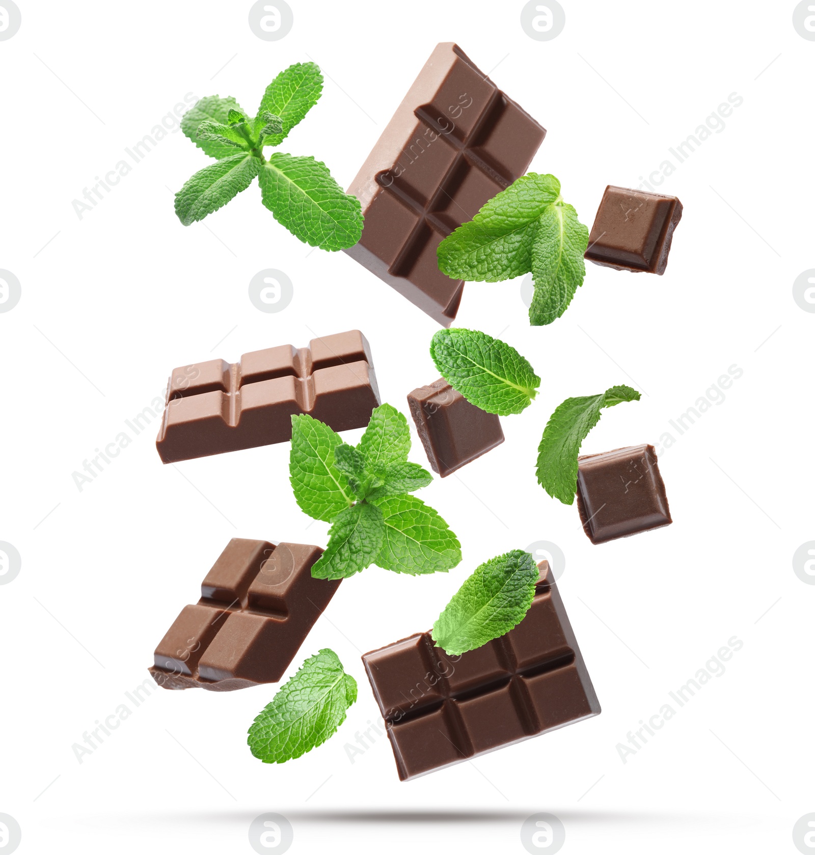 Image of Milk chocolate pieces and mint falling on white background