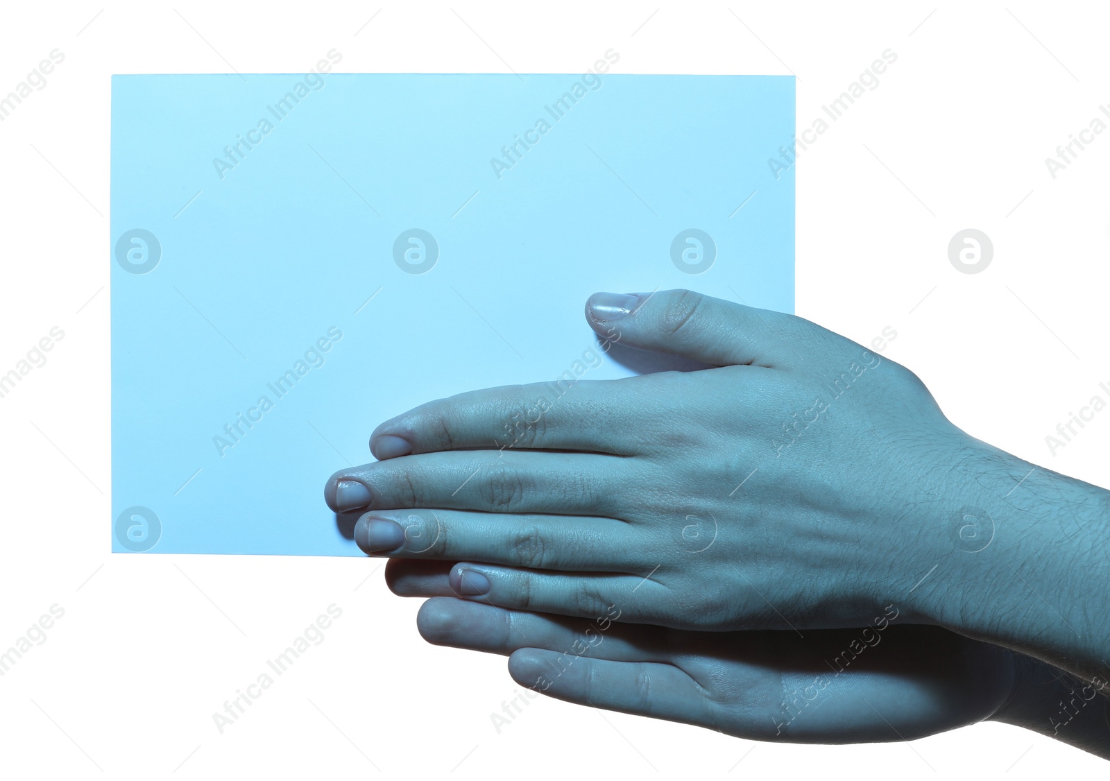 Photo of Man holding sheet of paper on white background, closeup and space for text. Color tone effect