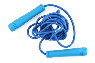 Photo of Blue skipping rope isolated on white, top view. Sports equipment