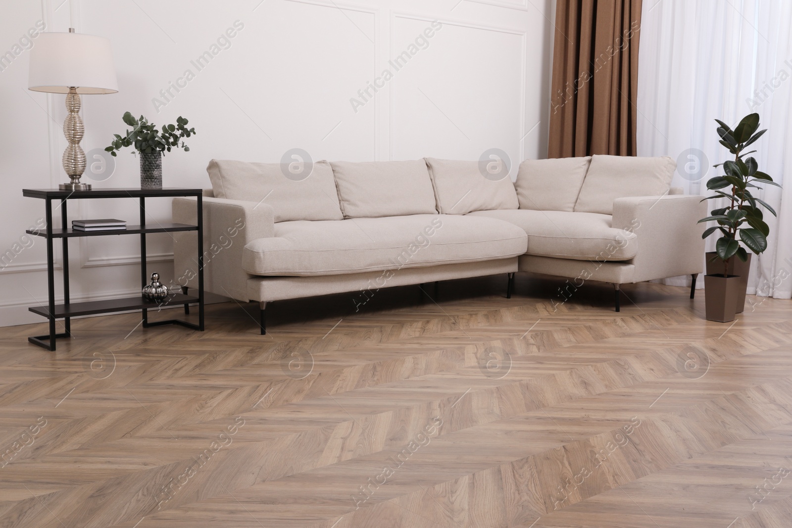 Photo of Modern living room with parquet flooring and stylish furniture