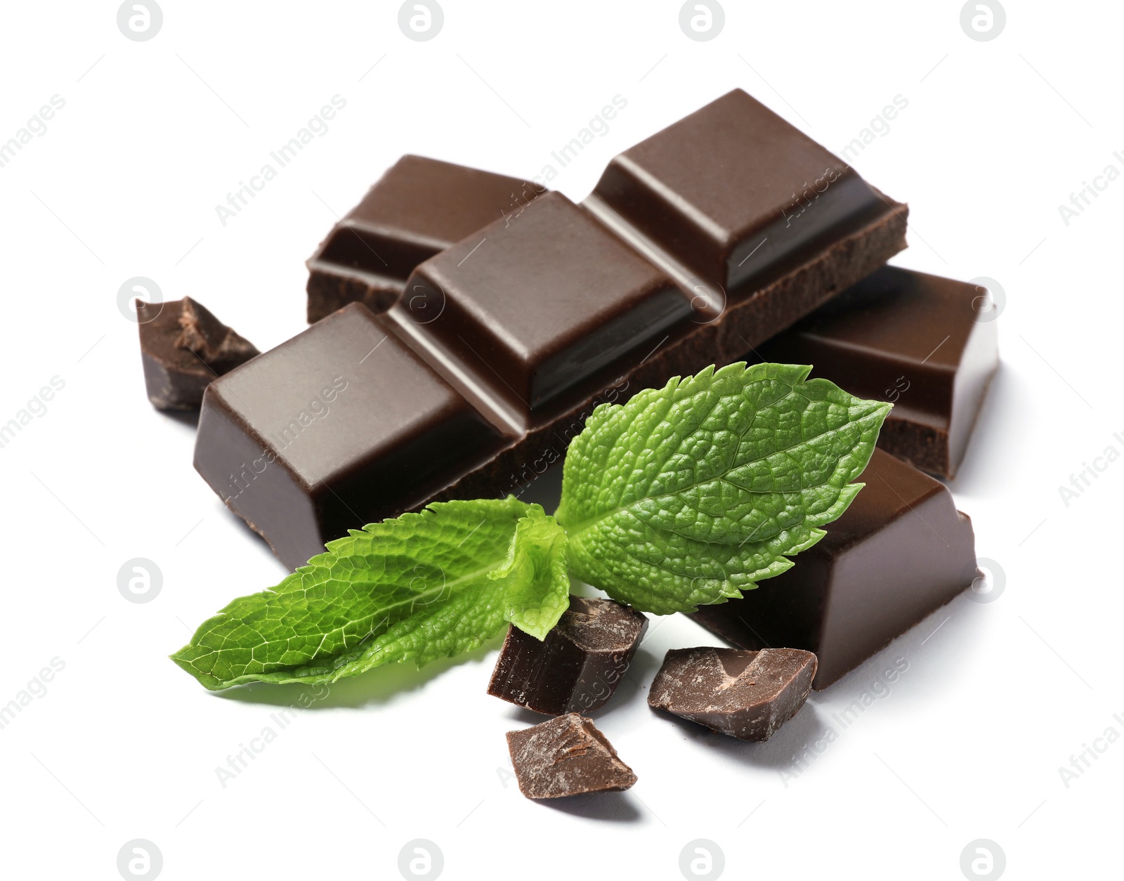 Photo of Pieces of dark chocolate with mint on white background