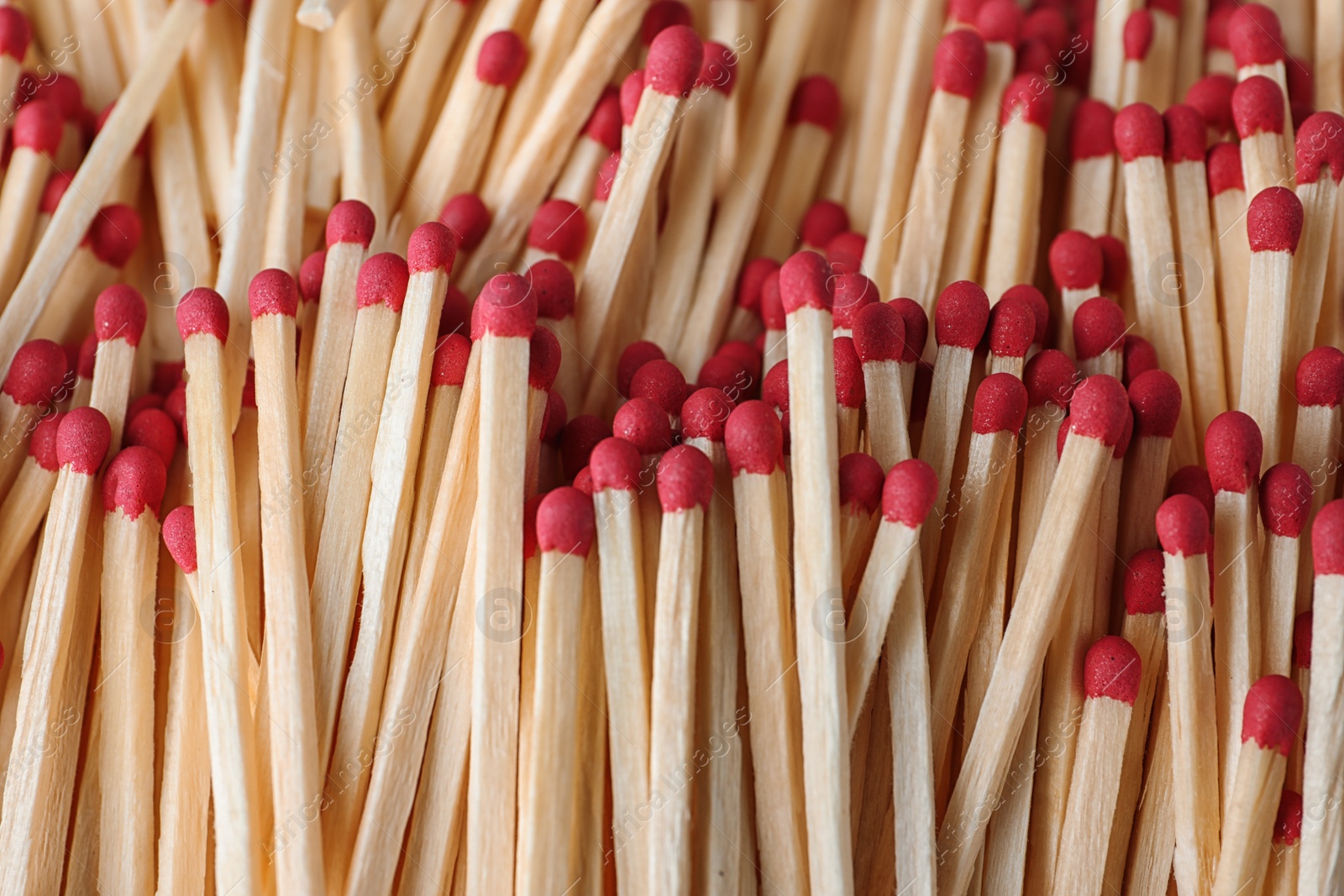 Photo of Pile of wooden matches as background, top view