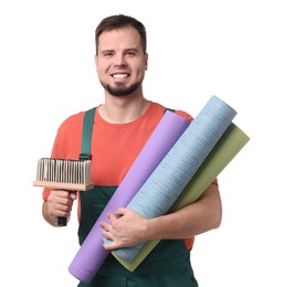 Photo of Man with wallpaper rolls and brush on white background