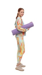 Photo of Young woman in sportswear with fitness mat on white background