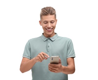 Happy young man sending message via smartphone on white background