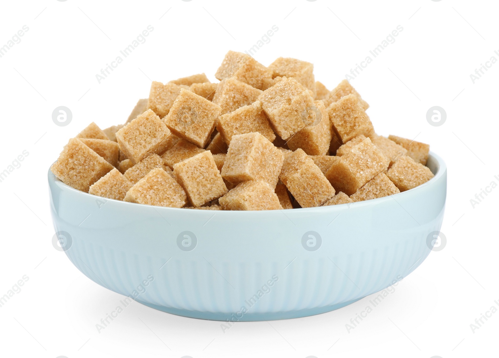 Photo of Bowl with cubes of brown sugar isolated on white