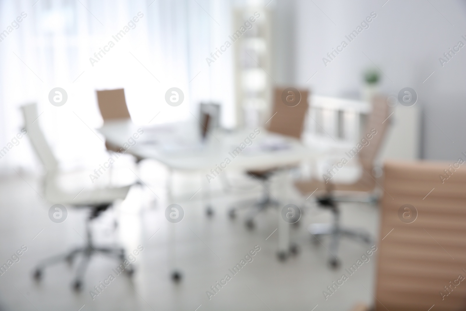 Photo of Modern brightly lit office with bokeh effect