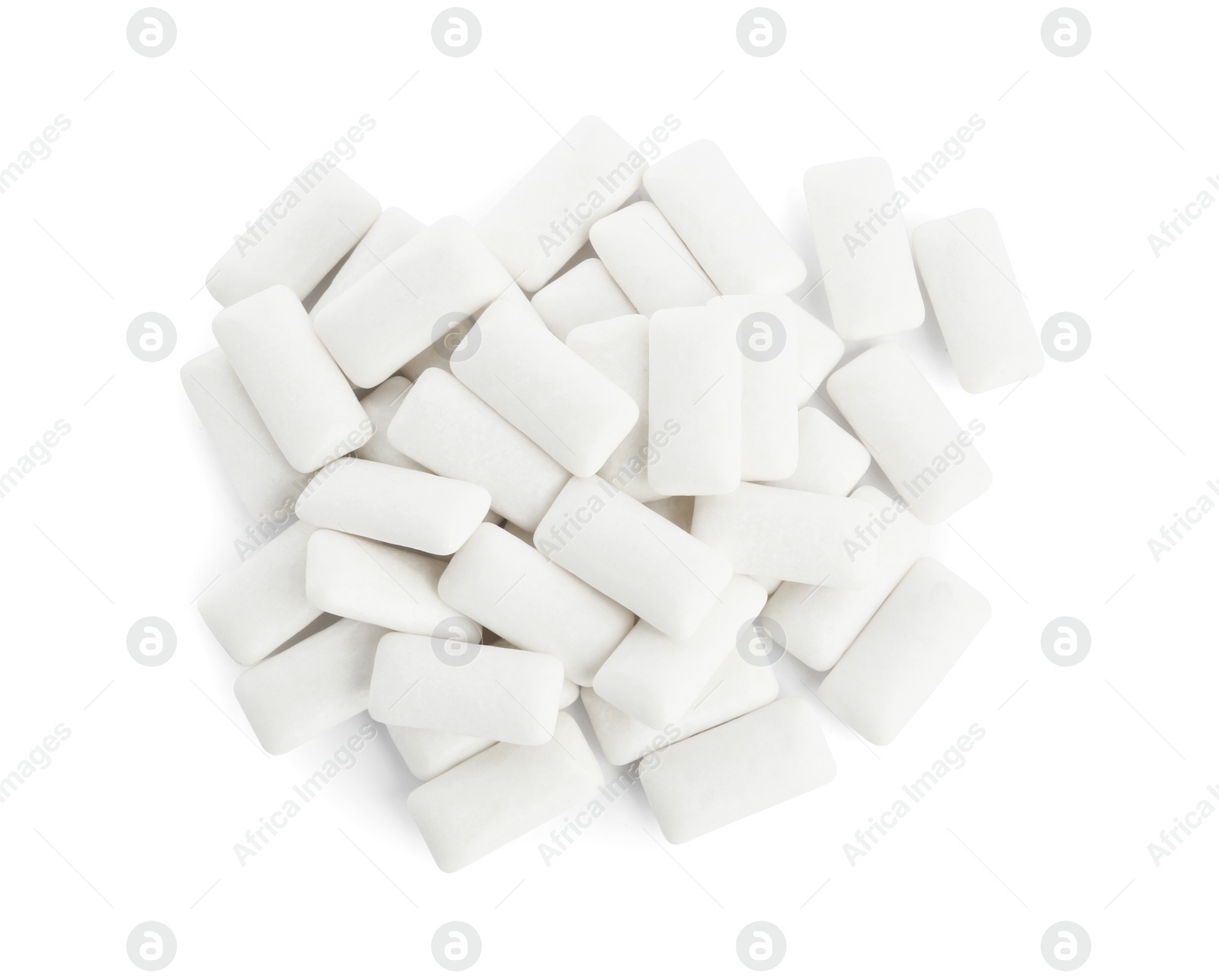 Photo of Heap of chewing gum pieces on white background, top view