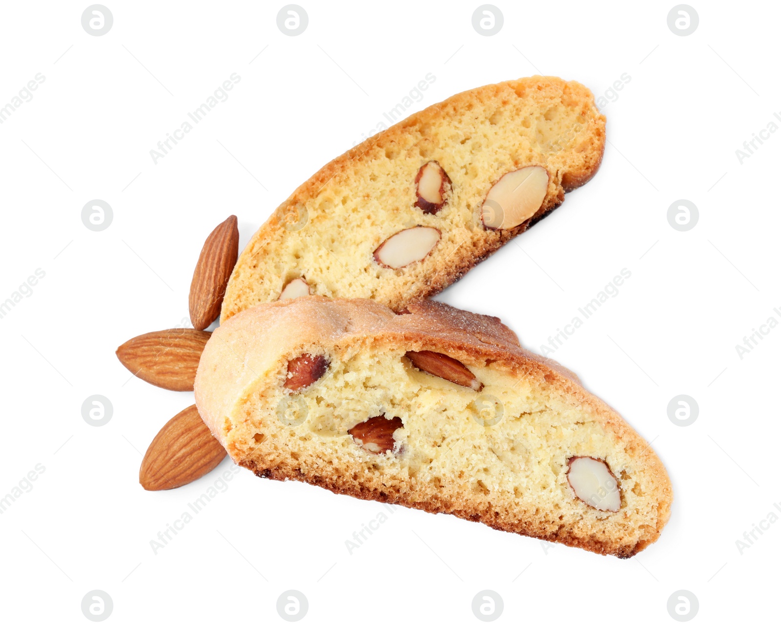 Photo of Slices of tasty cantucci and nuts on white background, top view. Traditional Italian almond biscuits