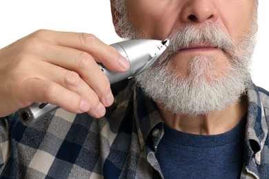 Photo of Man trimming mustache on white background, closeup