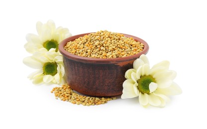 Photo of Fresh bee pollen granules in bowl and flowers isolated on white
